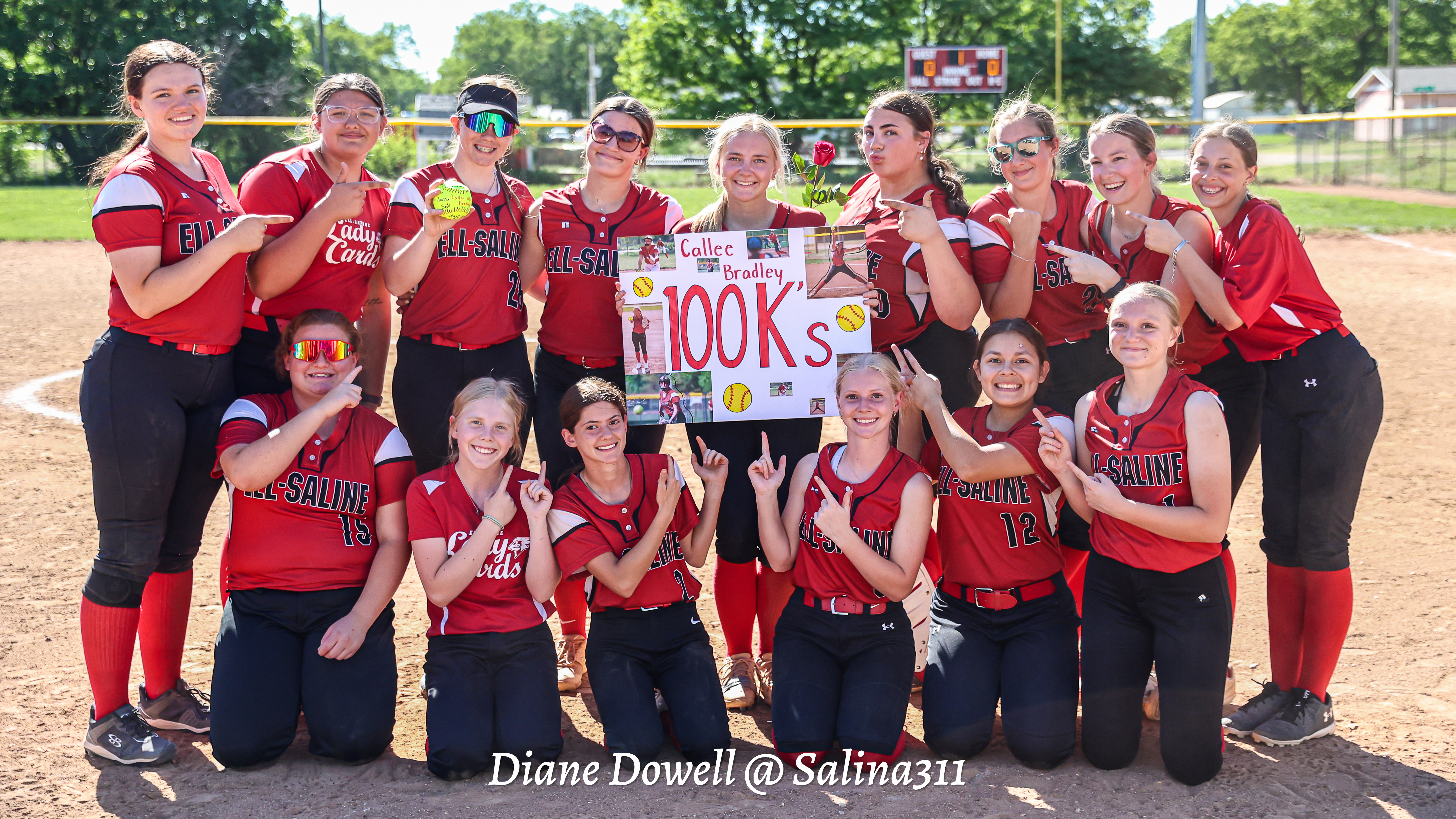 The Ell-Saline Lady Cardinals help Callee Bradley celebrate her milestone strikeouts on May 8, 2026.