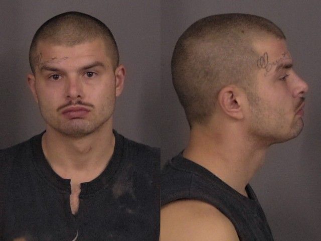 Salina Police Arrest Man on Warrants and Drug Charges Near Bishop Street