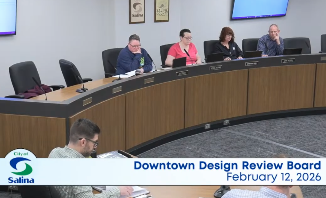 Downtown Business Owner Seeks Clarification on Window Sign Regulations at Design Review Board Meeting