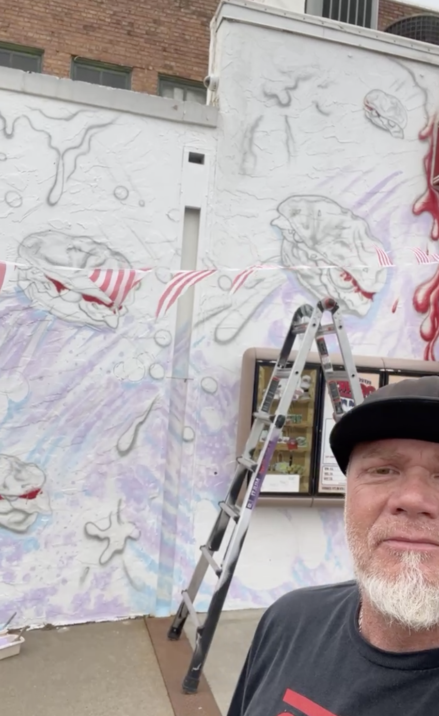 Cozy Inn mural resumes while court battle over Salina sign rules continues