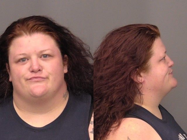 Woman Arrested After Neighbor Dispute Escalates to Assault