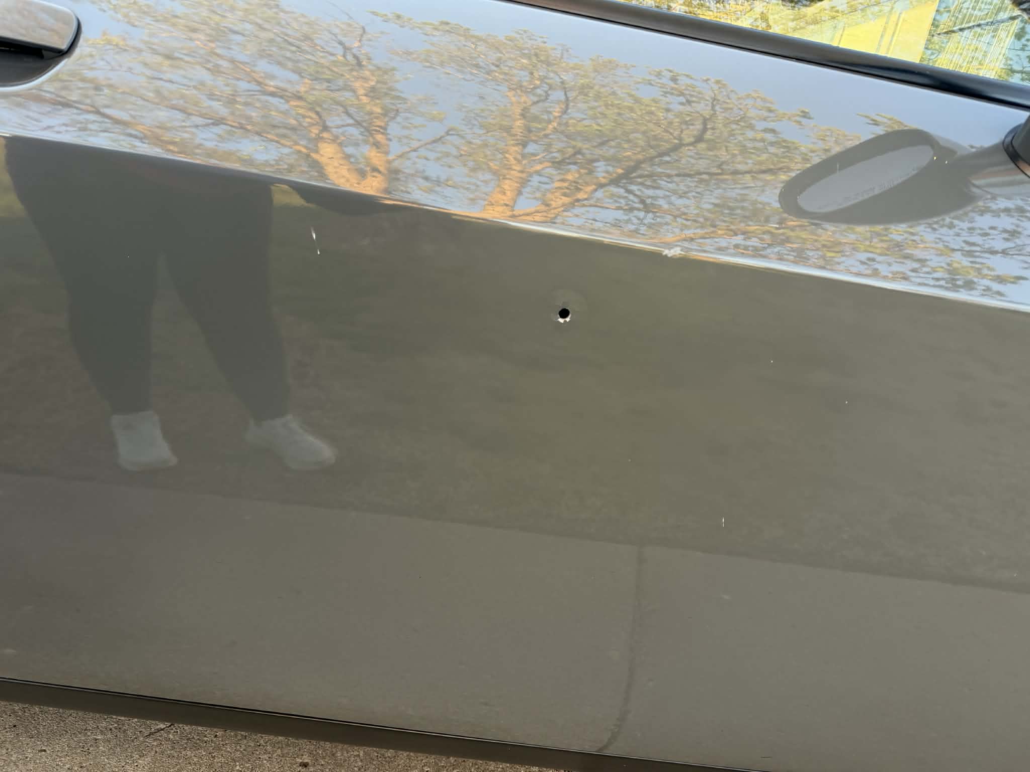 Bullet hole in side door.&nbsp;