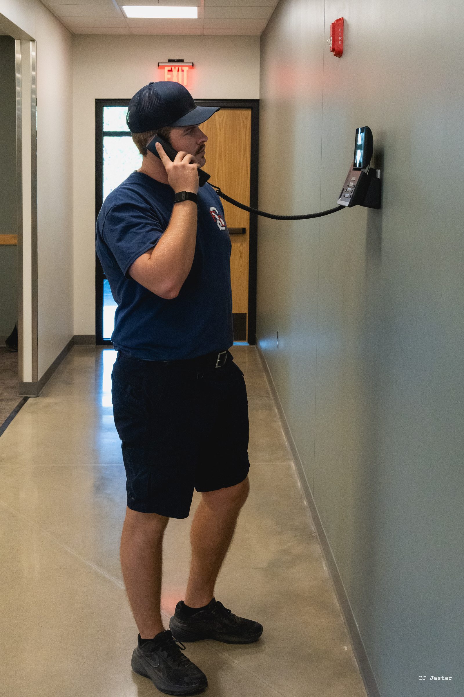 Firefighter Conner Holle taking a phone call. 