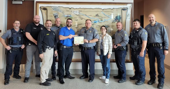Saline County Sheriff’s Office recognizes deputies, K-9 Cash for career milestones